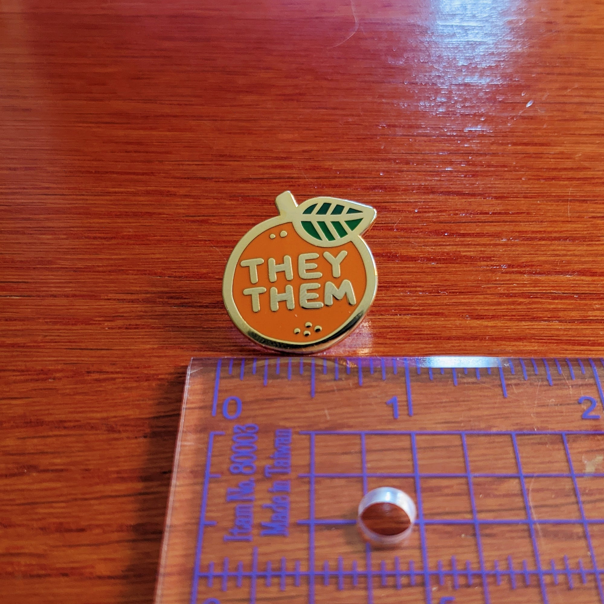Pronoun Orange Pin - he/they