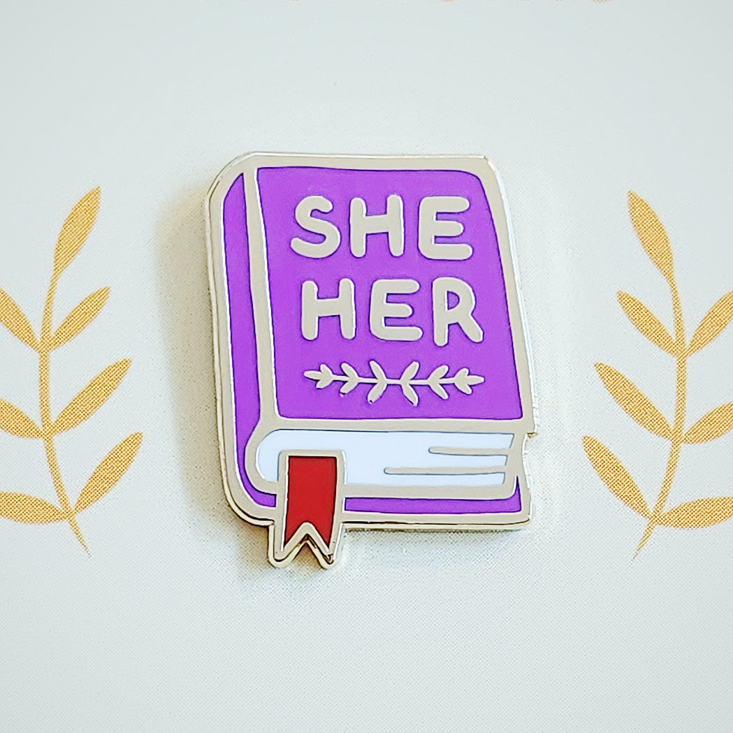 Pronoun Book Pin - she/her
