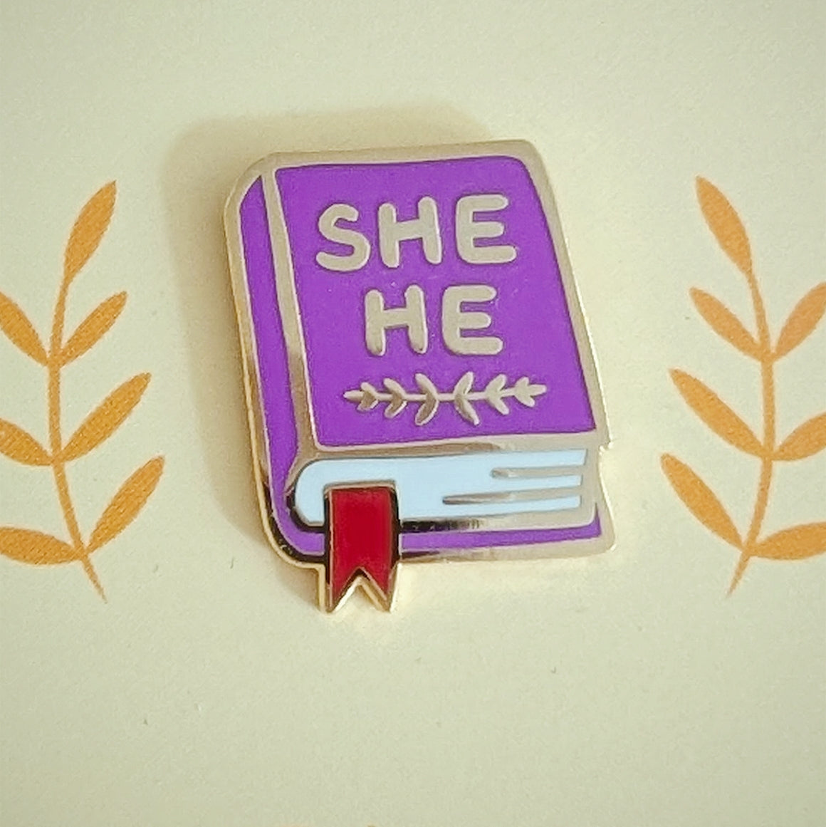 Pronoun Book Pin - she/he