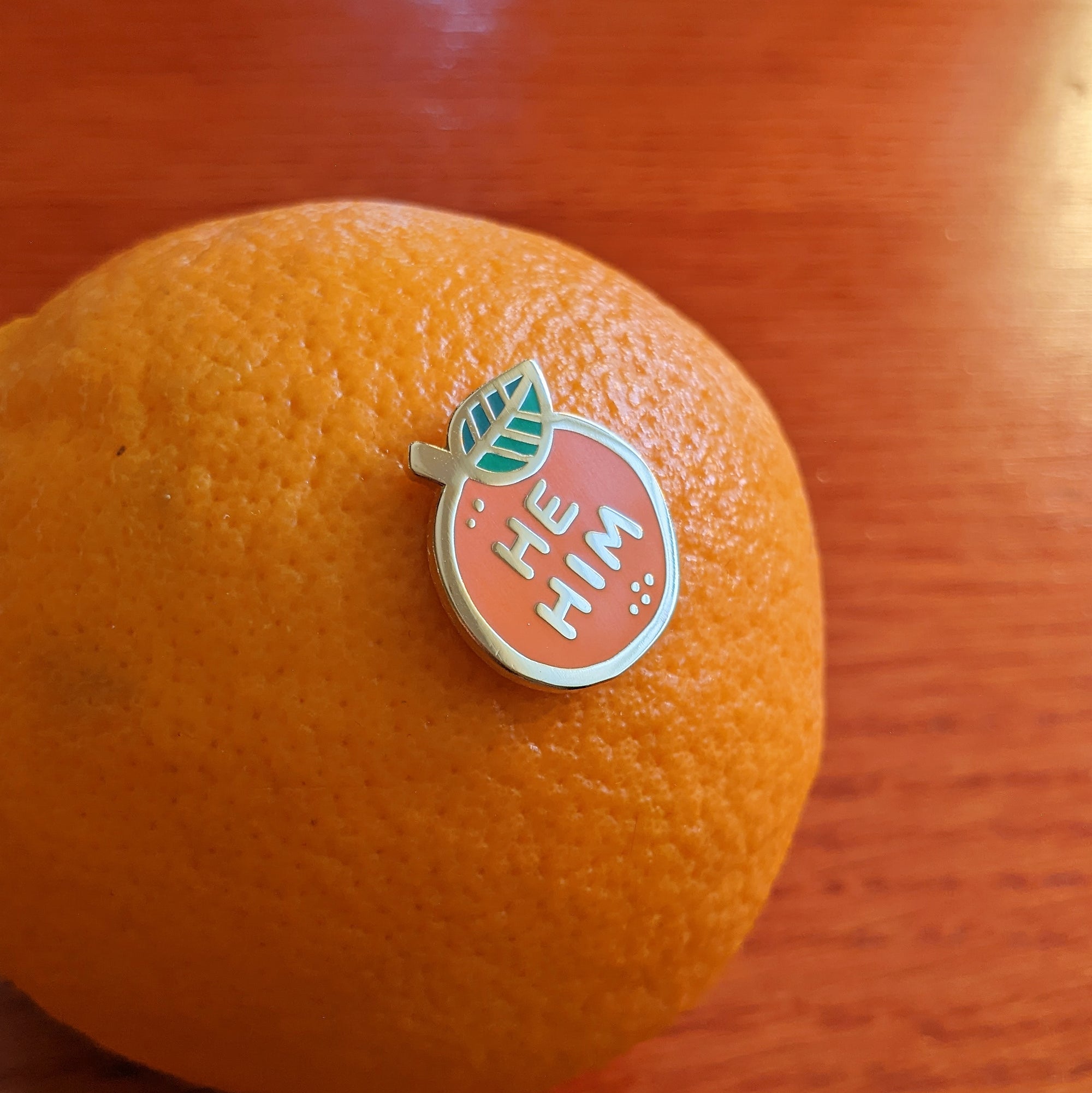 Pronoun Orange Pin - he/him
