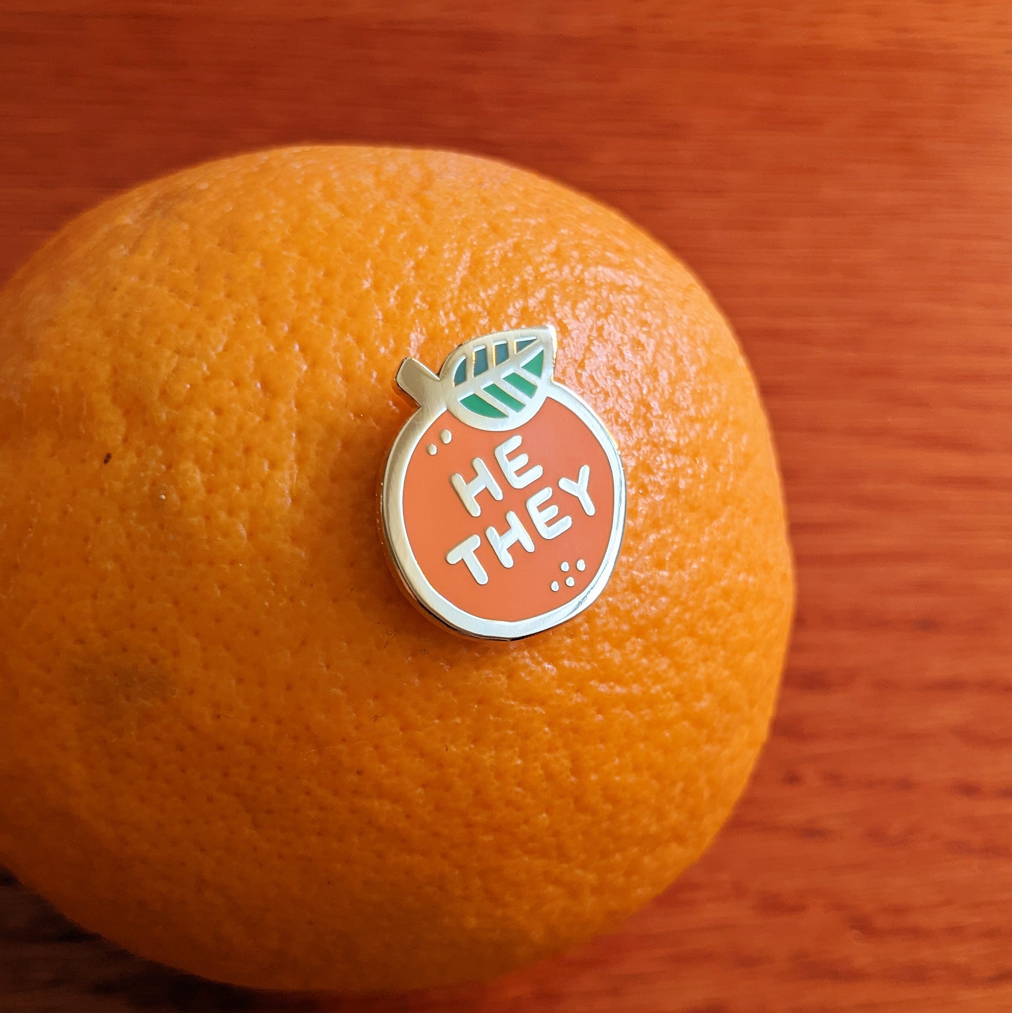Pronoun Orange Pin - he/they