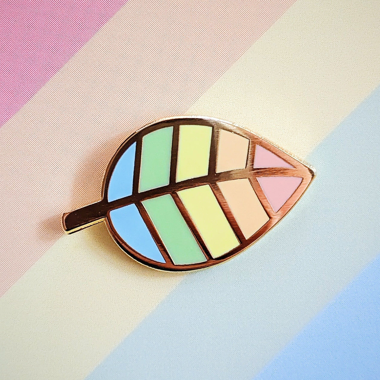 misomomo pastel rainbow colored leaf pride enamel pin